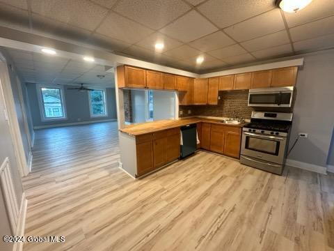 Building Photo - "Spacious 3-Bedroom Gem at 57 1/2 Saratoga...