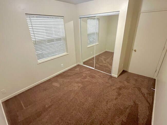 Building Photo - Updated Cully Neighborhood 3 Bedroom Townhome with Hardwoods, Fully Fenced Yard