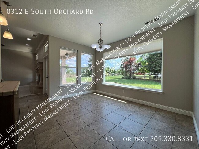 Building Photo - 8312 E Orchard Rd
