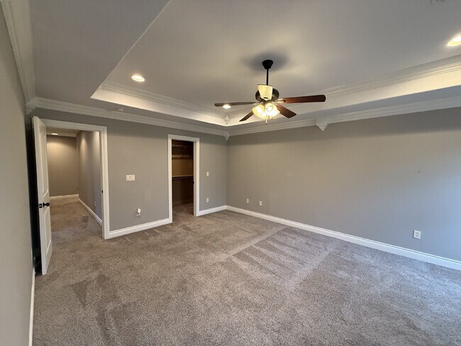 Building Photo - Great Outdoor Living Space / 4BR with 3 Ca...