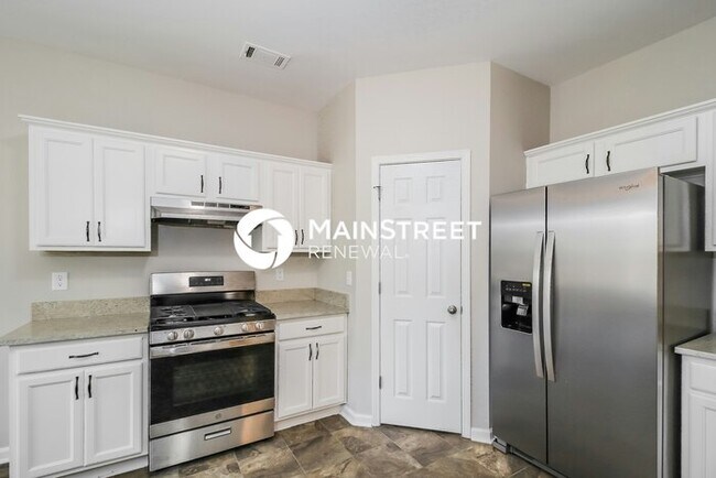 Building Photo - 6 Bedroom Pet-Friendly Home in Buford, GA with Main Street Renewal