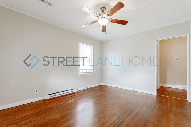 Building Photo - REDUCED! - NOW OFFERING HALF OFF FIRST FUL...