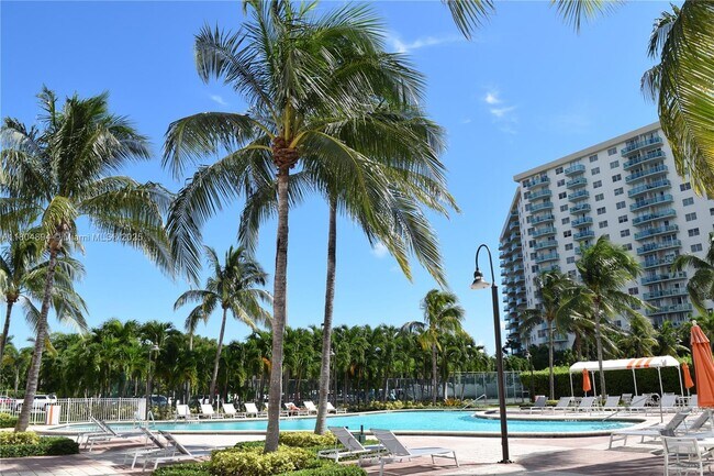 Building Photo - 19380 Collins Ave