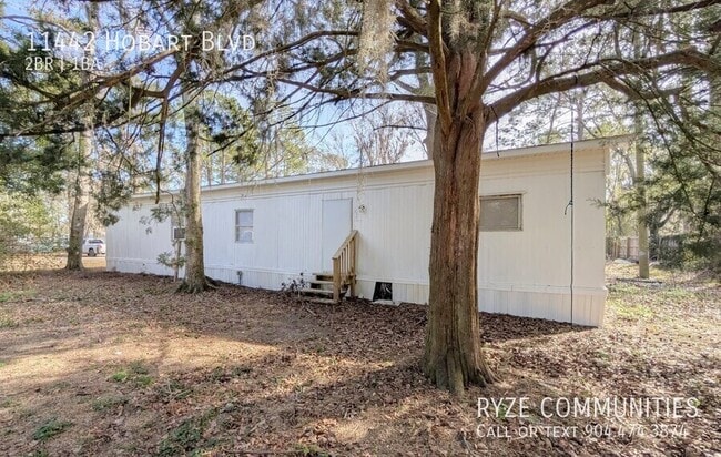 Building Photo - 11442 Hobart Blvd