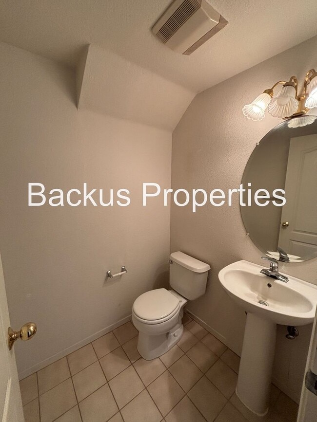 Building Photo - Great two-level home in Las Palmas II with scenic views