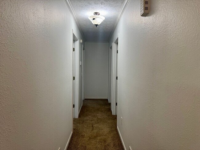 Building Photo - For Rent in St. Robert, MO – Spacious 4 Be...