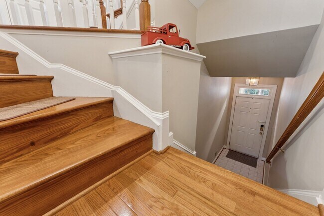 Building Photo - Discover this stunning four-level townhous...