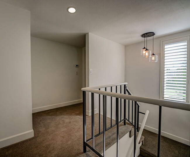 Building Photo - Updated, 3 bedroom 2.5 bath townhouse located in the Newport Riviera Community