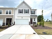 Building Photo - 4 Bedroom End Unit Townhome Almost New