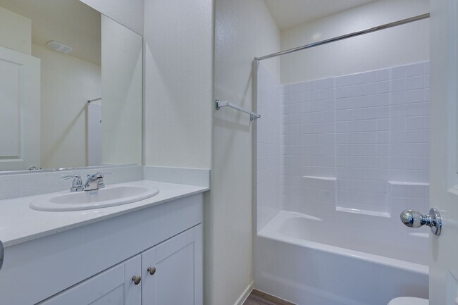 Building Photo - NW 3 Bedroom Townhouse!! Gated Community Pool!! 2 Car Garage!!! No Carpet downstairs.