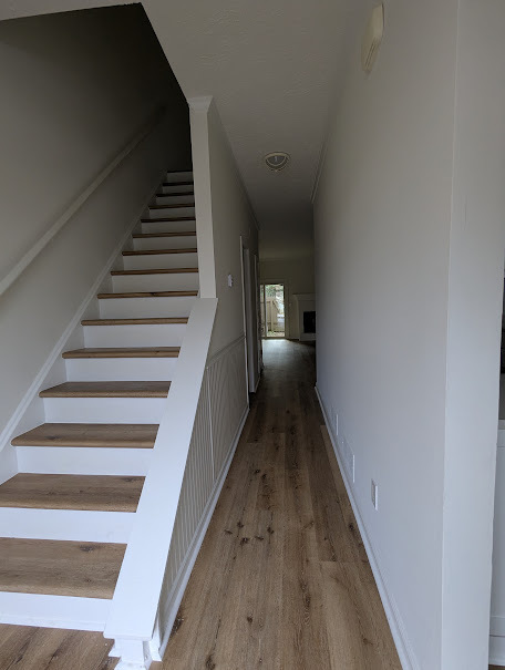 Stairway and View to Living Room - 4012 Elm St