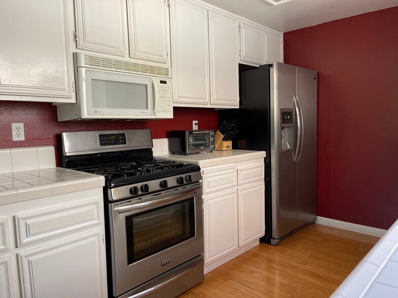Kitchen which is painted white now - 231 N Broadway