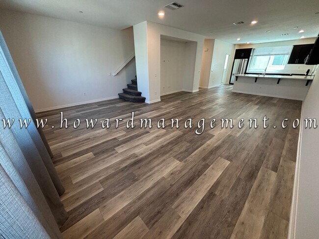 Building Photo - 3 Bed 3 Bath, Three Story Townhome with pr...