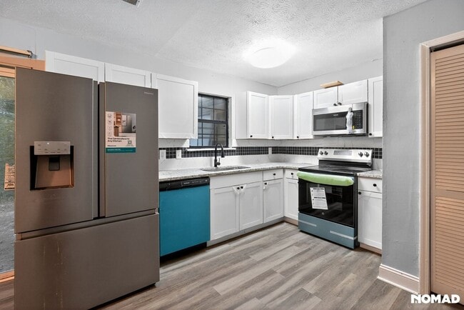 Building Photo - 5952 Stonewall Dr