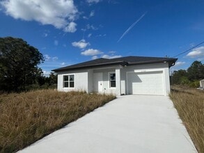 Building Photo - Brand-New Modern 2BR/2BA Home with Garage – Quiet West Lehigh Location