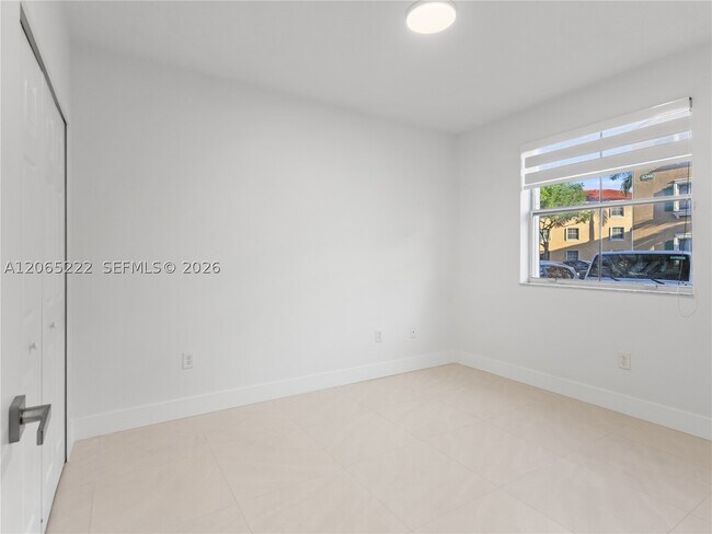Building Photo - 6420 NW 114th Ave