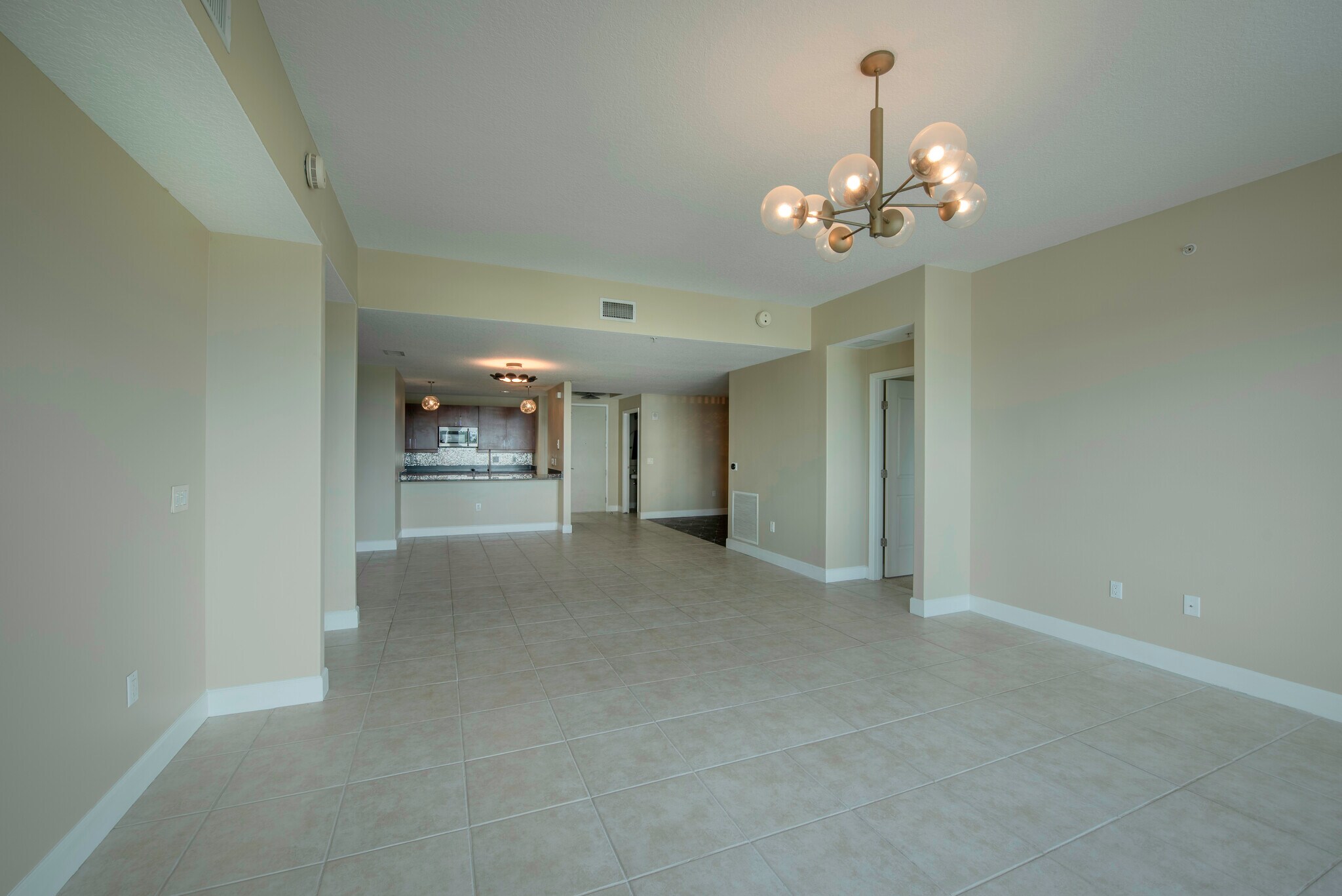 living area facing kitchen - 100 S Eola Dr
