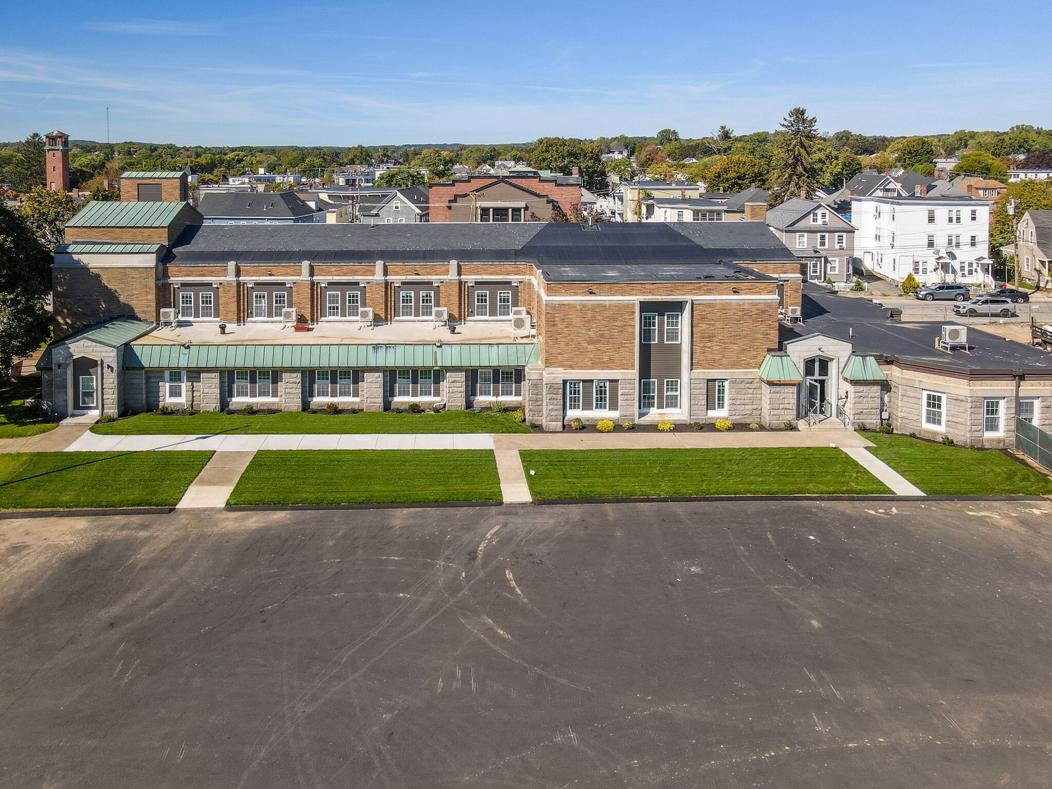 gated parking lot - 241 W 6th St