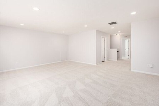 Building Photo - Updated 3-Bedroom Home with 3 Baths, Open-Concept Layout, Luxury Flooring & Bright Modern Kitchen