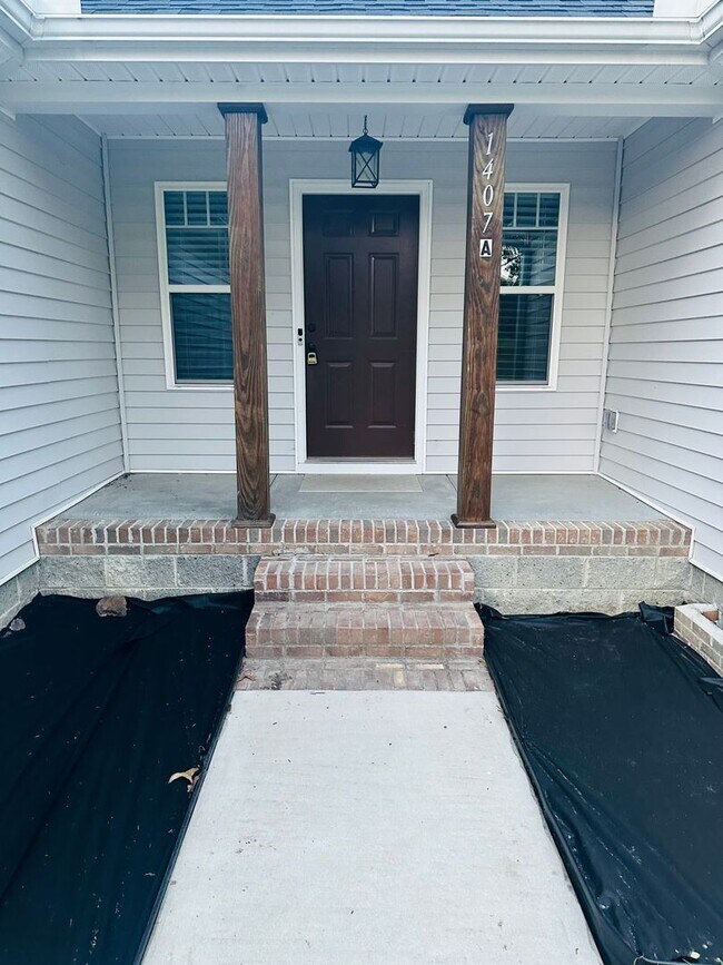 Building Photo - Spacious 4BR Home on 1.98 Acres with Modern Finishes in Tupelo Hills