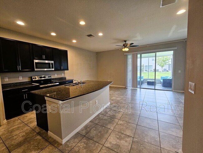 Building Photo - 7115 Grand Elm Dr