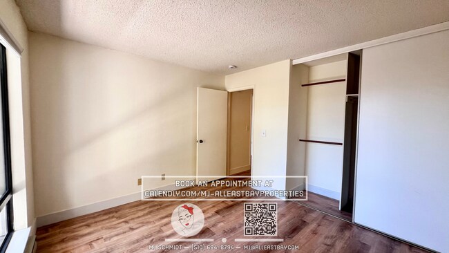 Building Photo - Beautiful sunny top floor condo, includes ...