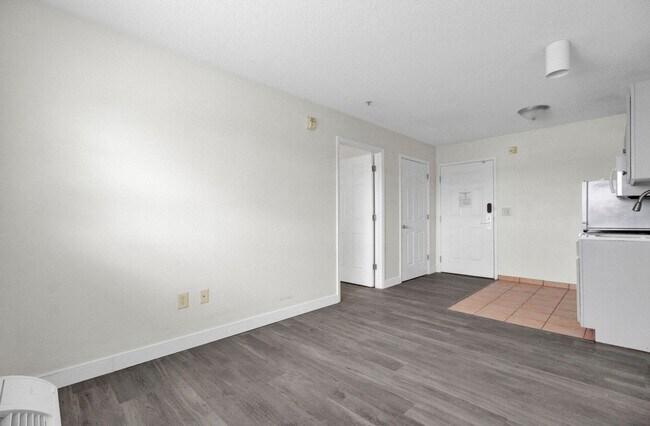 Building Photo - FIRST MONTH FREE- STUDIO APT- Available 1/...
