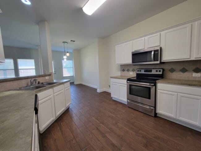 Building Photo - TRAVIS RANCH - 4 BEDROOM IN FORNEY