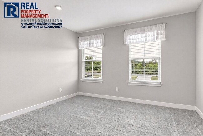 Building Photo - Great 4 bd 2.5 ba with attached garage and large deck!