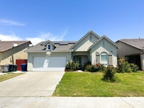 Building Photo - Cute As A Bug 3/2 Natomas Home (PLEASE REA...