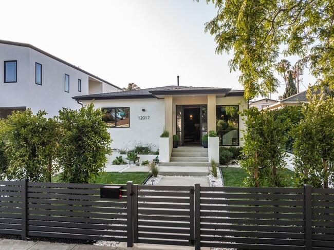 Building Photo - Brand-New Designer Home — 2 Bed + 2 Bath + Office | Gated Yard & Private Driveway Parking