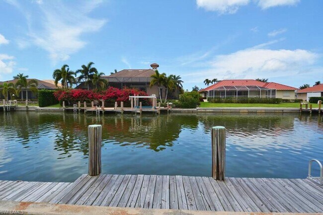 Building Photo - Spacious and Meticulously Maintained Water...