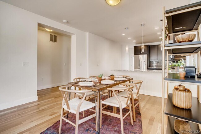 Building Photo - "Charming 2-Bed, 2-Bath Home with Gleaming Hardwood Floors in Vibrant Denver!"