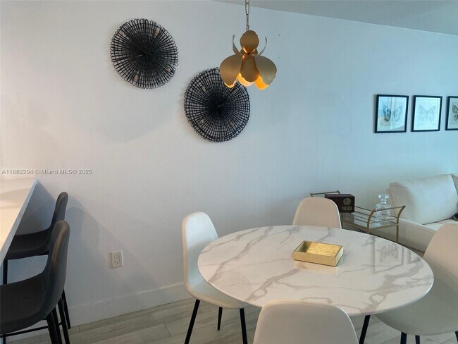 Building Photo - 5880 Collins Ave