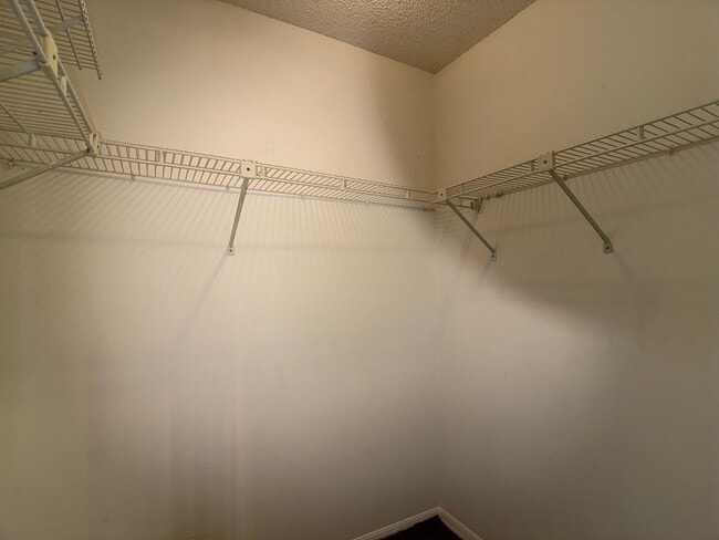 Building Photo - Spanish-Style 3 Bedroom, 2.5 Bath Mediterranean Rooftop Townhouse – Basic Cable & Wi-Fi Included!