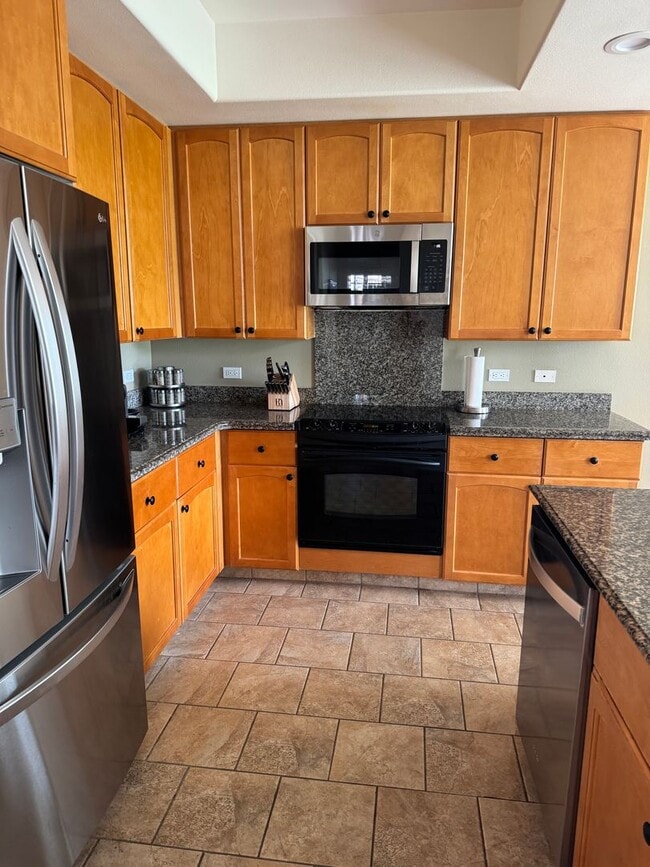 Building Photo - Luxurious Fully Furnished Long-Term Townhome Rental