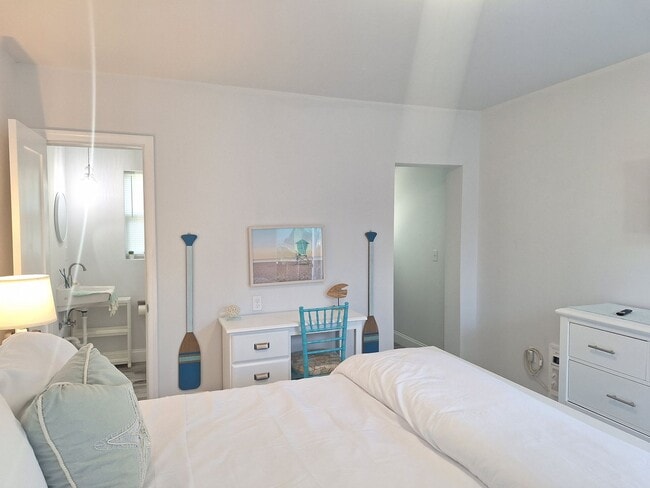 Building Photo - LONG TERM FURNISHED EFFICIENCY-ALL UTILITES INCLUDED!