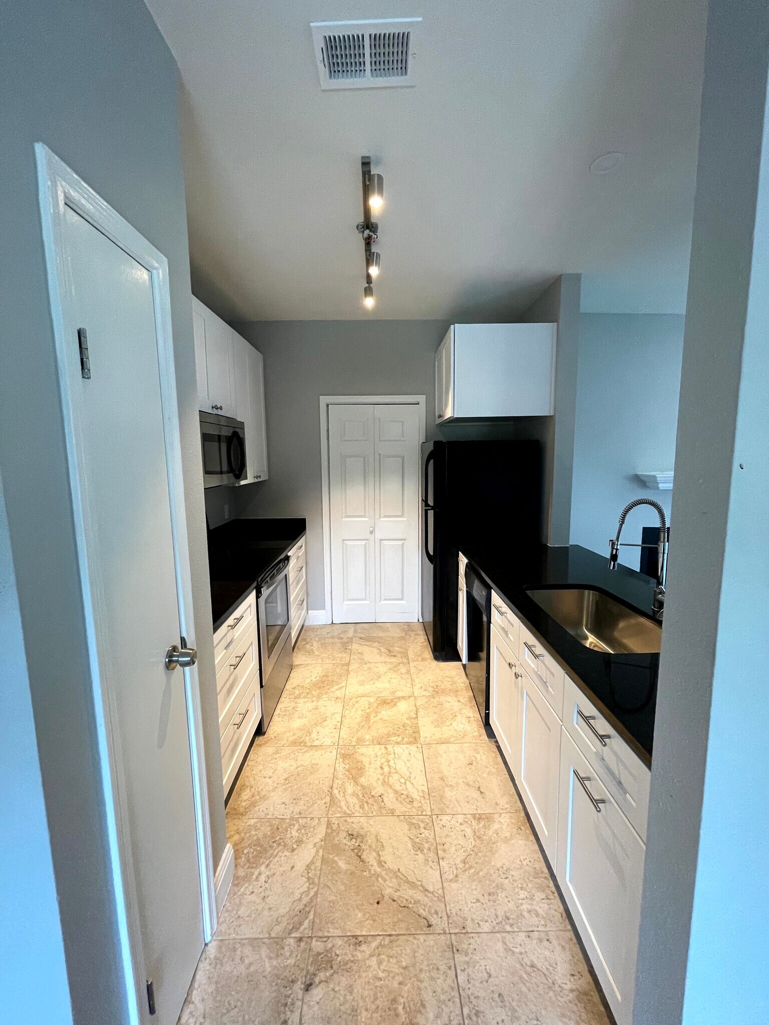 Kitchen with brand new counter tops and cabinets - 12166 Metric Blvd