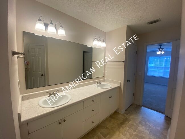 Building Photo - 7418 Woodmont Rd