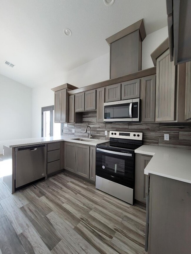 Building Photo - 8670 E 40th Ln