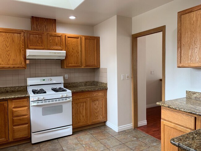 Building Photo - Split Level 4-bedroom, 3-bathroom Home in ...