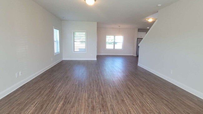 Building Photo - "Spacious 4-Bedroom Retreat with Modern Gr...