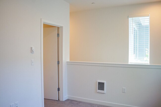 Building Photo - Modern & Sleek One-Bedroom Townhouse Ready...
