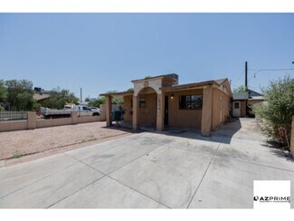 Building Photo - Discover this Charming 2/1 Phoenix Triplex...