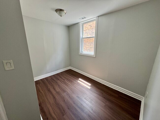 Building Photo - 1651 S Drake Ave