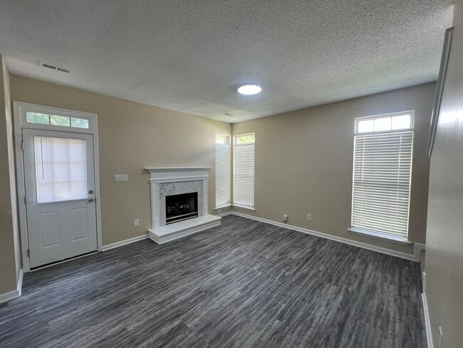 Building Photo - Welcome to Timbertop5127, a well-appointed 4-bedroom, 2.5-bath home in Charlotte, NC.