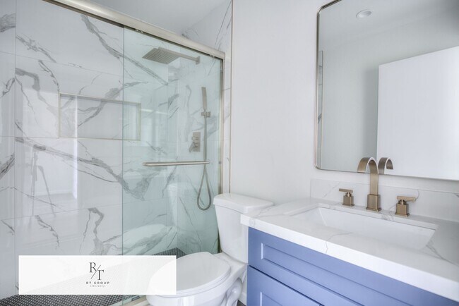 Building Photo - Fully Remodeled | Spacious & Bright Townhome