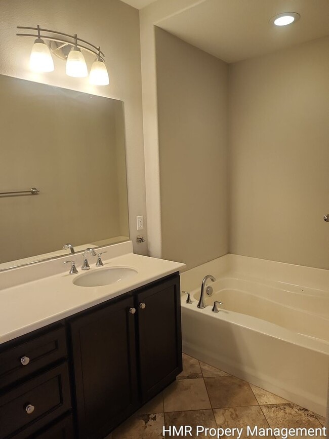 Building Photo - Modern 2-Bedroom Condo Near Victoria Gardens