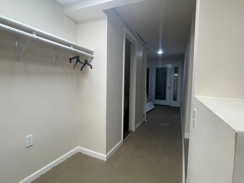 Hall to stairs to front entrance - 31 N Main St