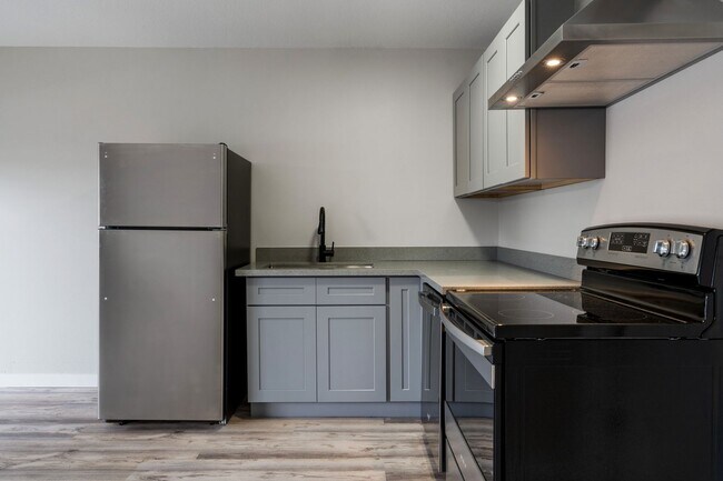 Building Photo - 2BR with dishwasher, on site laundry!